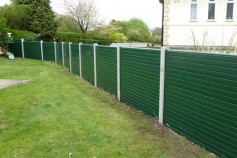 Classic green gravel boards in existing concrete.